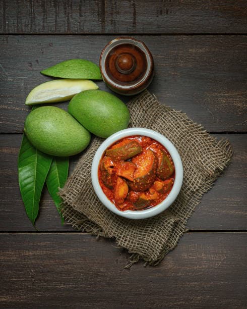 Mango pickle bowl on wooden table
